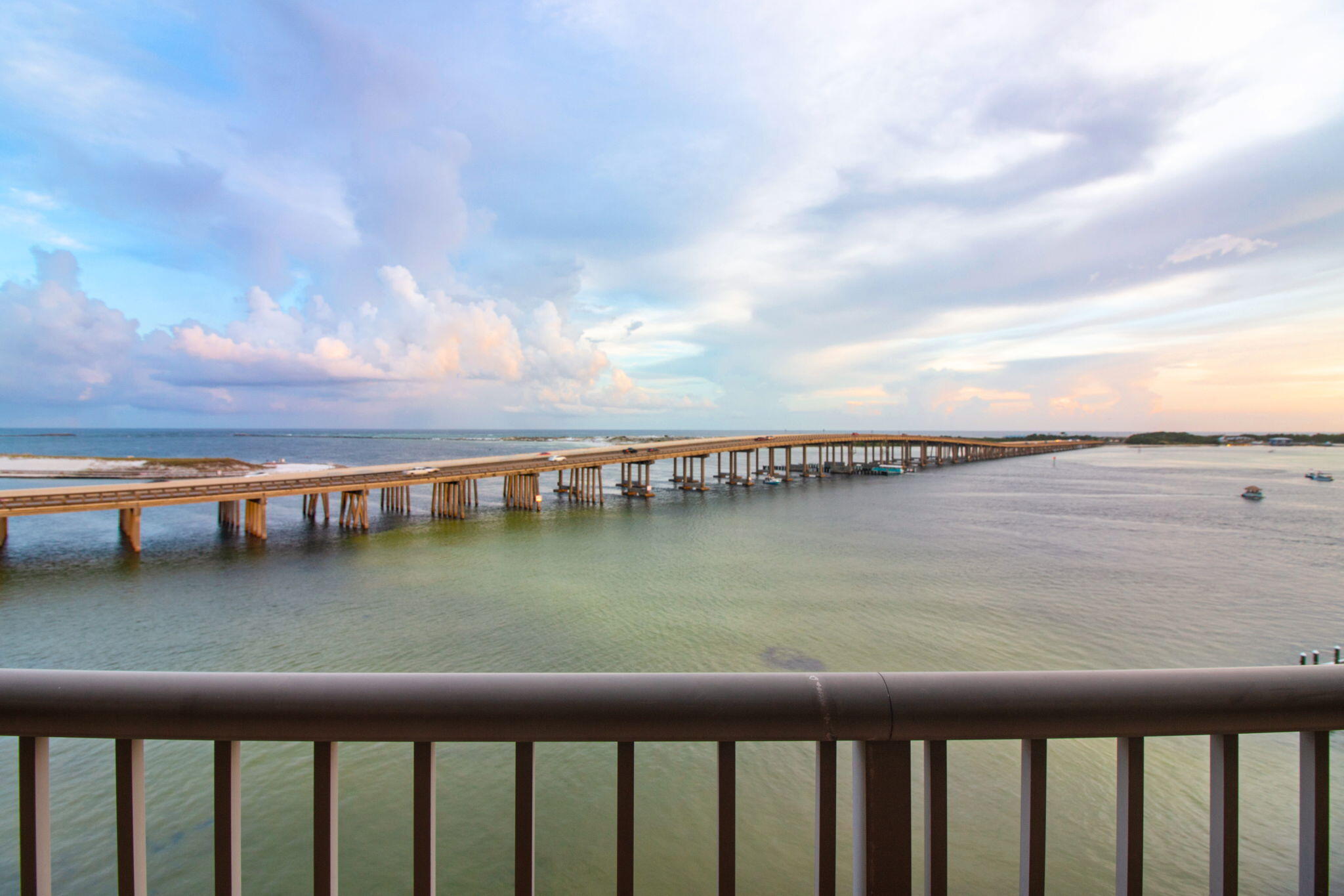 5 Calhoun Avenue, Unit 606 Destin, FL 32541 - Photo 14 of 37 a view of a lake with a city from a terrace