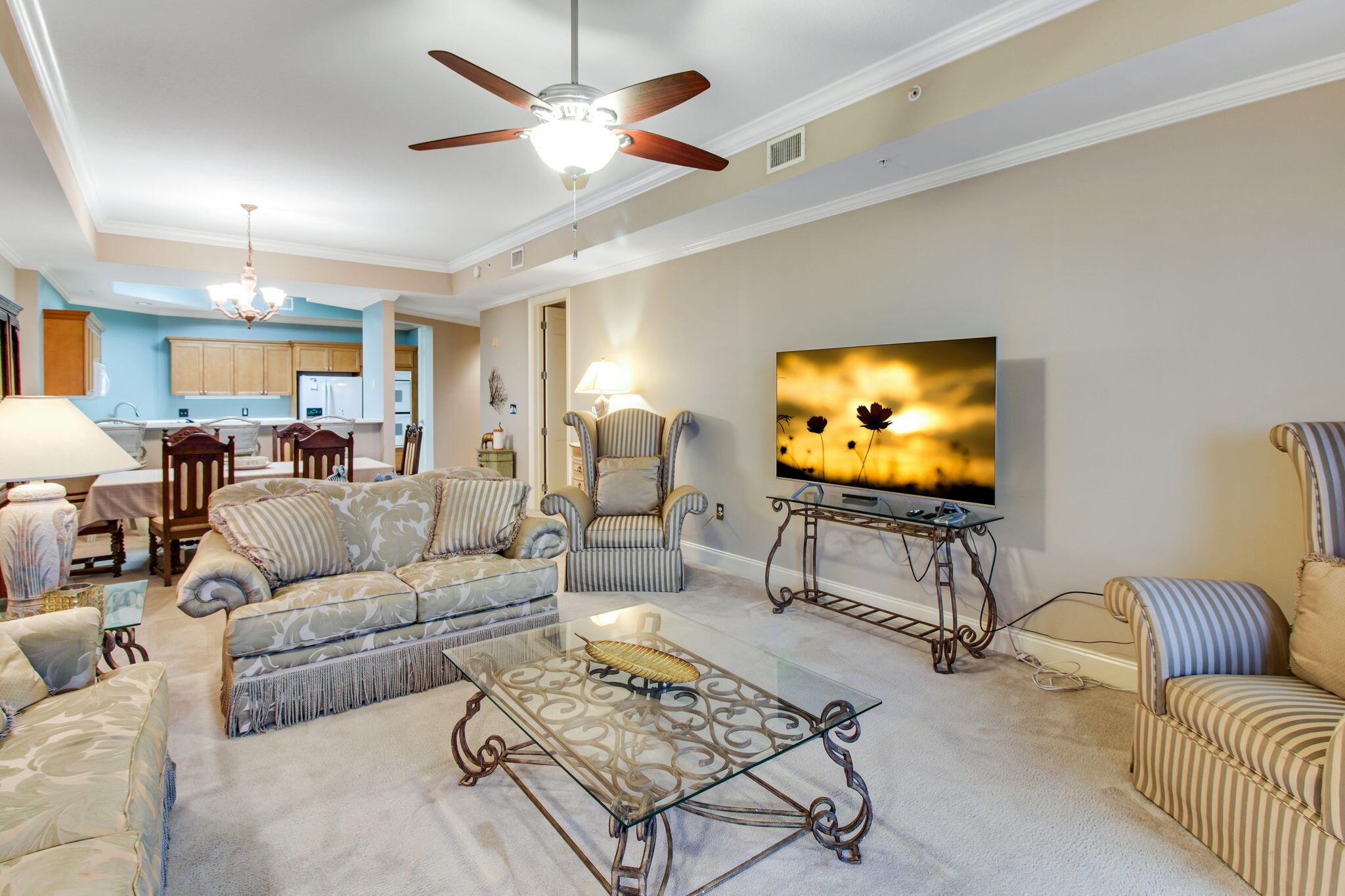 5 Calhoun Avenue, Unit 606 Destin, FL 32541 - Photo 15 of 37 a living room with furniture and a flat screen tv