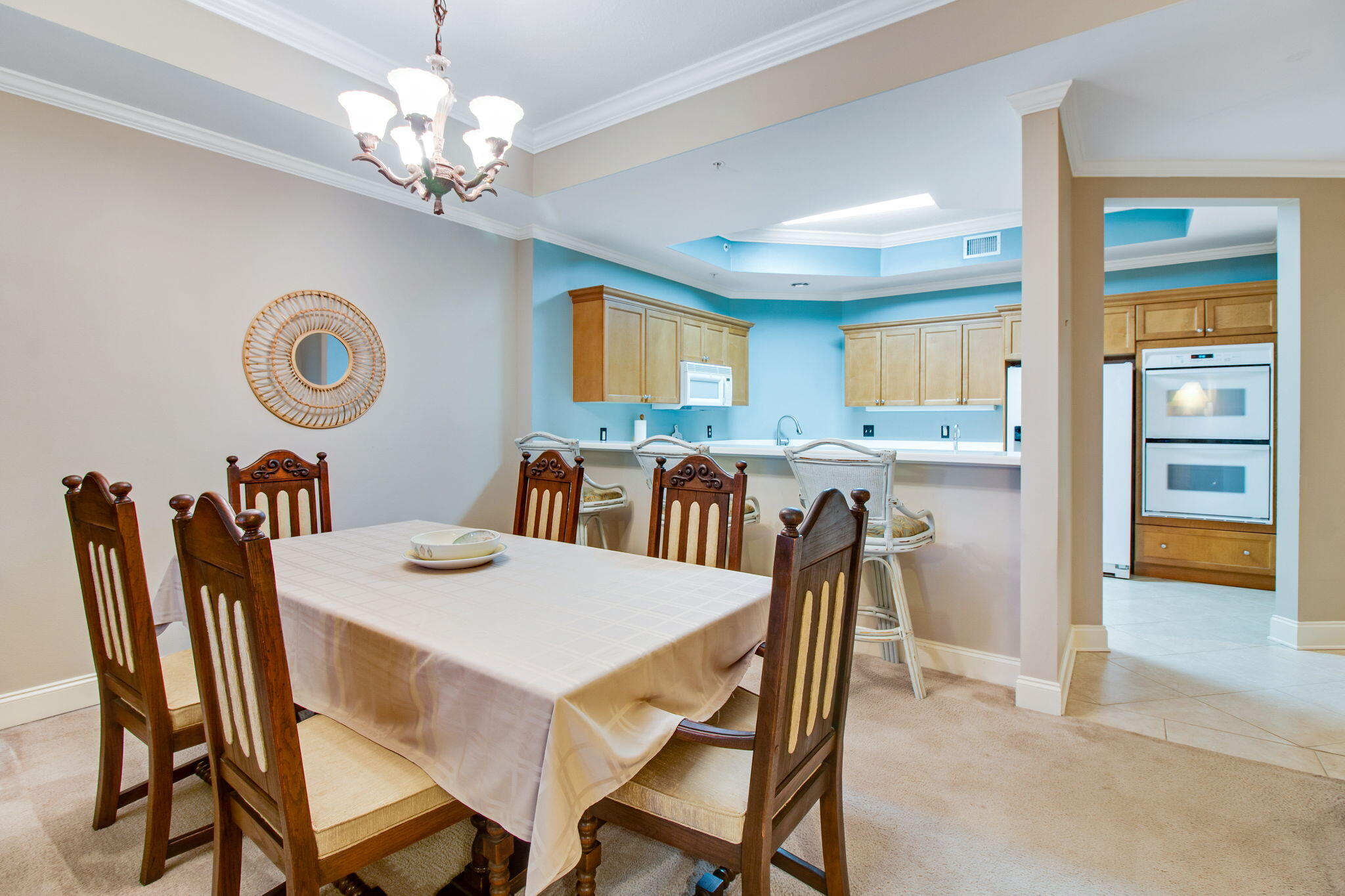 5 Calhoun Avenue, Unit 606 Destin, FL 32541 - Photo 19 of 37 a view of a dining room with furniture and chandelier