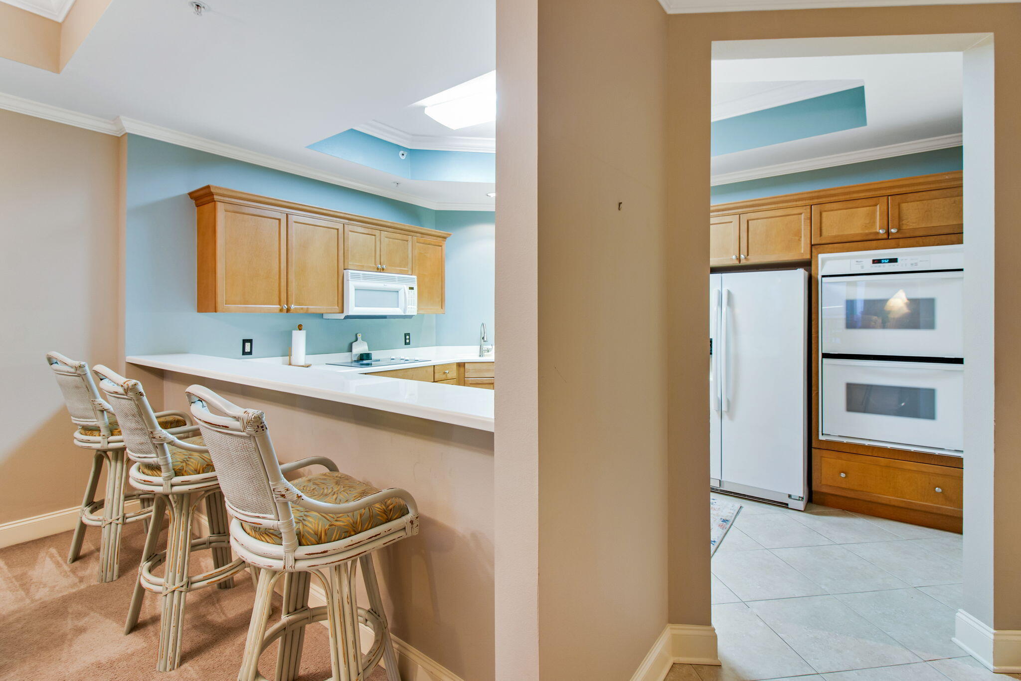 5 Calhoun Avenue, Unit 606 Destin, FL 32541 - Photo 24 of 37 a bathroom with a sink a light fixture and a mirror