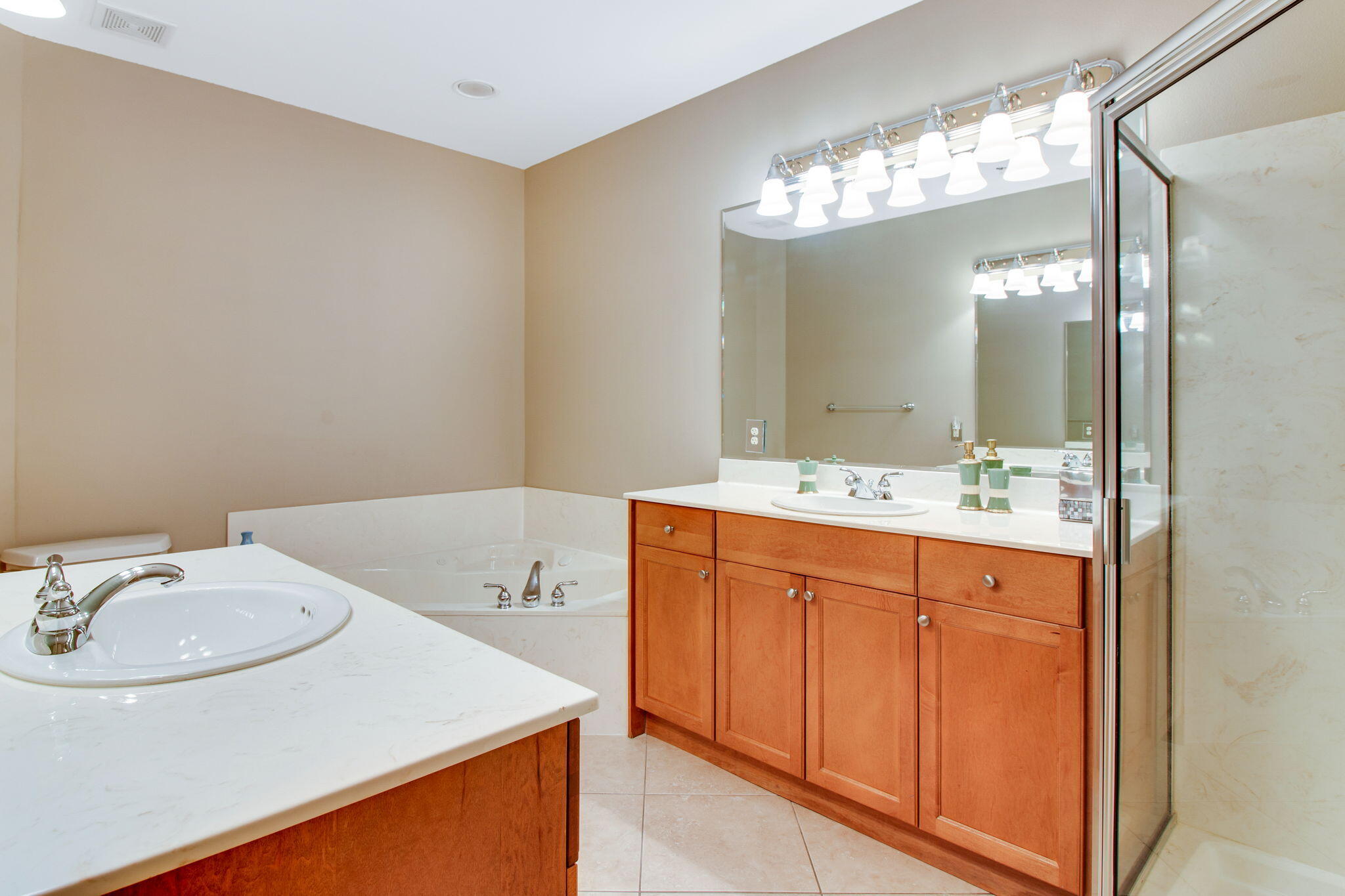 5 Calhoun Avenue, Unit 606 Destin, FL 32541 - Photo 27 of 37 a bathroom with a sink double vanity and a mirror