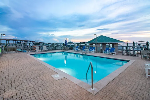 a view of a swimming pool with a patio