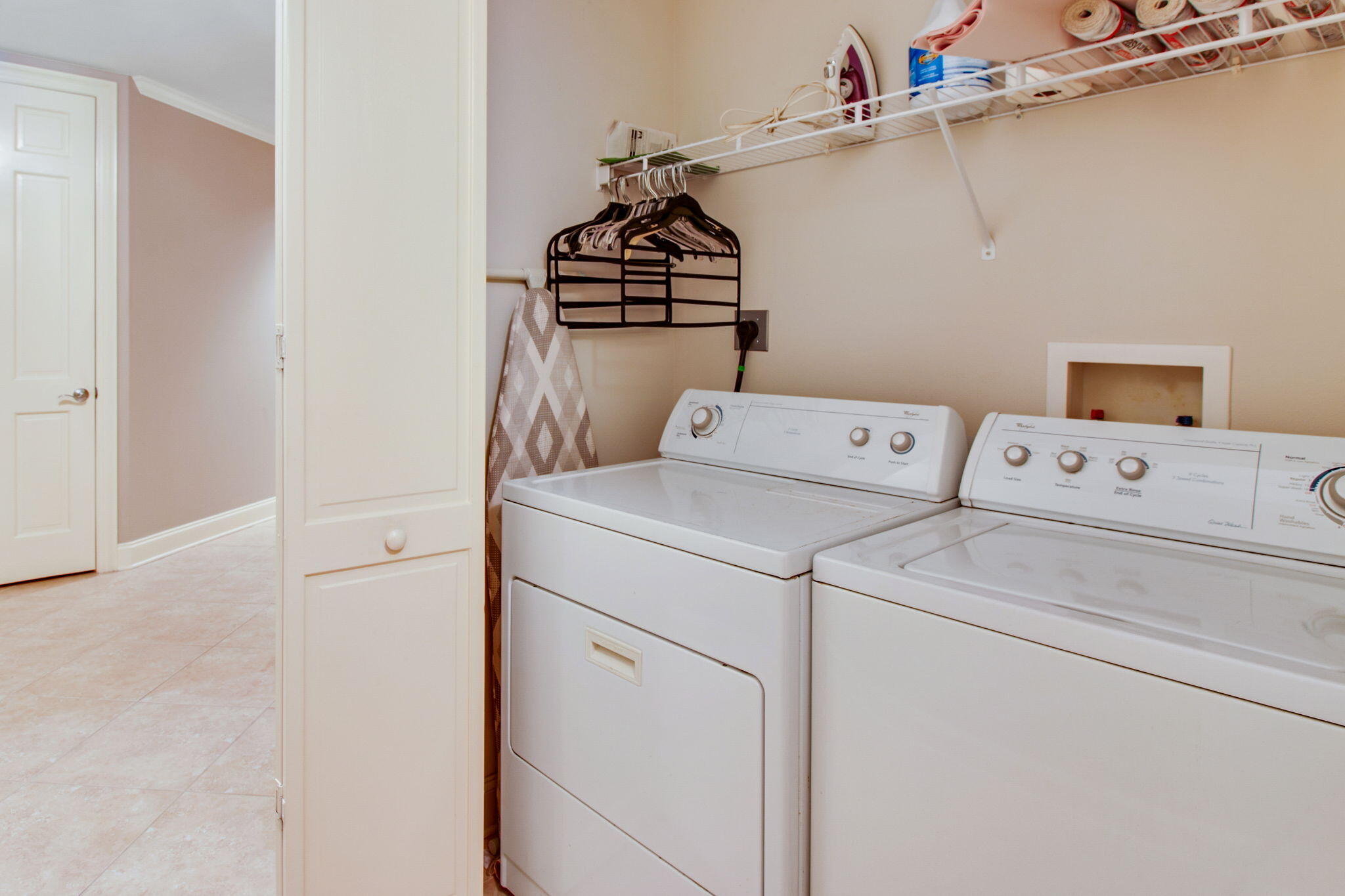 5 Calhoun Avenue, Unit 606 Destin, FL 32541 - Photo 34 of 37 a utility room with dryer and washer