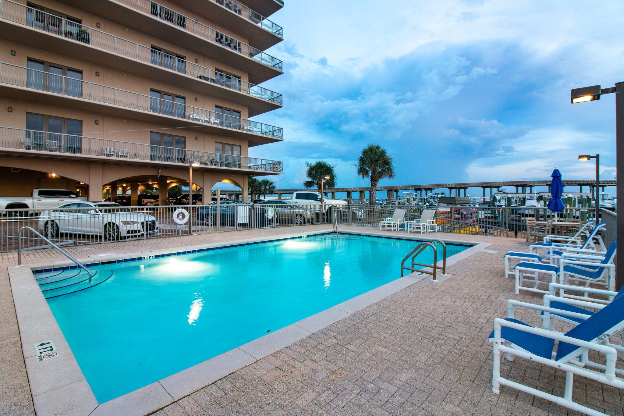 5 Calhoun Avenue, Unit 606 Destin, FL 32541 - Photo 5 of 37 a view of a swimming pool with outdoor seating