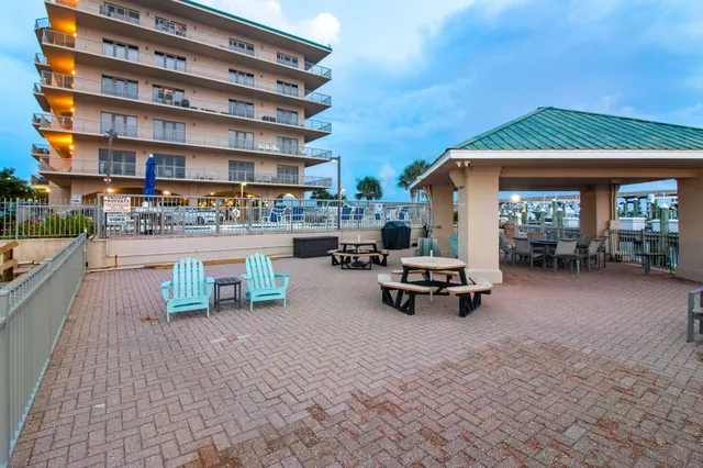 a view of building with outdoor seating