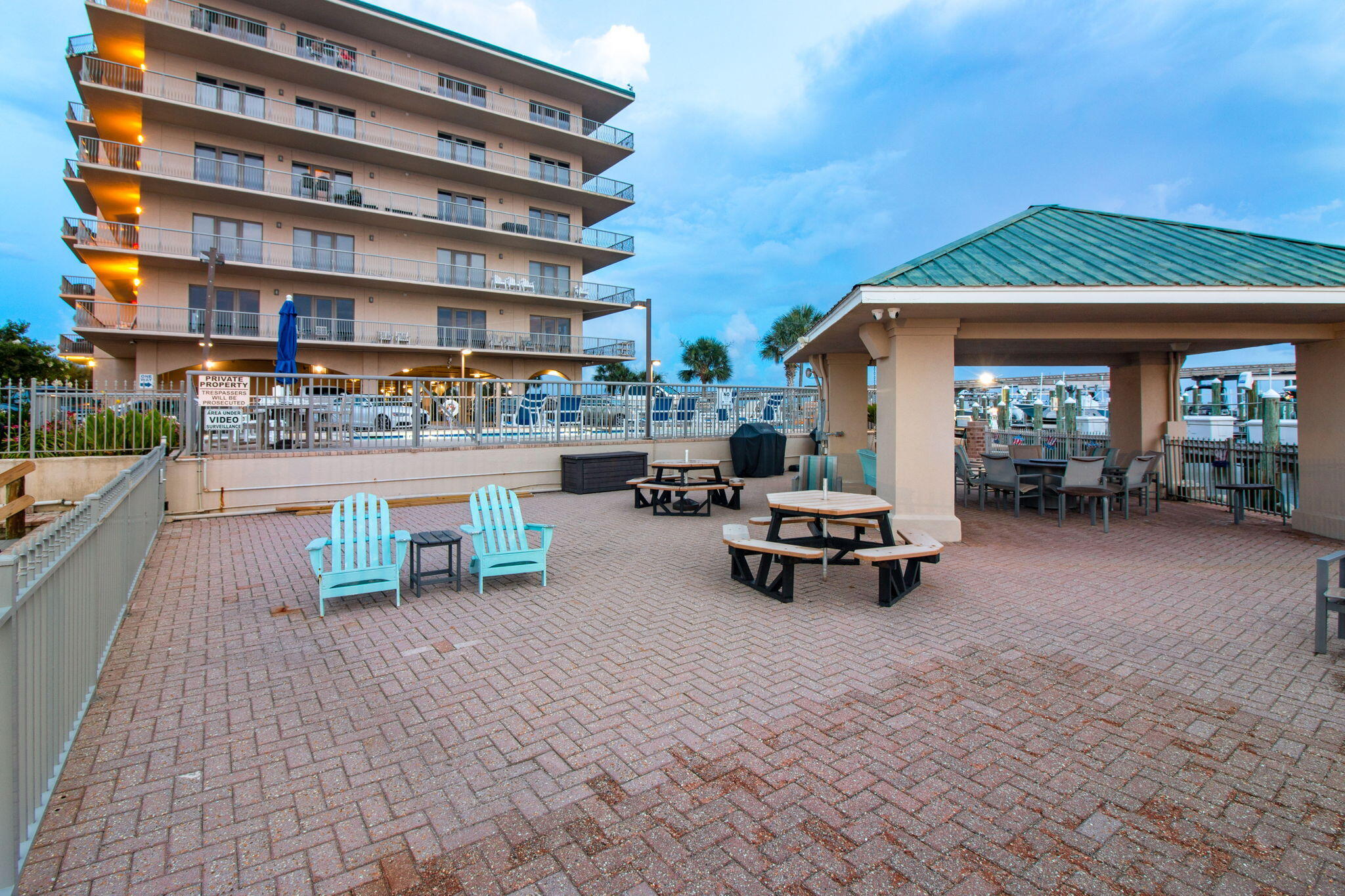 5 Calhoun Avenue, Unit 606 Destin, FL 32541 - Photo 6 of 37 a view of building with outdoor seating