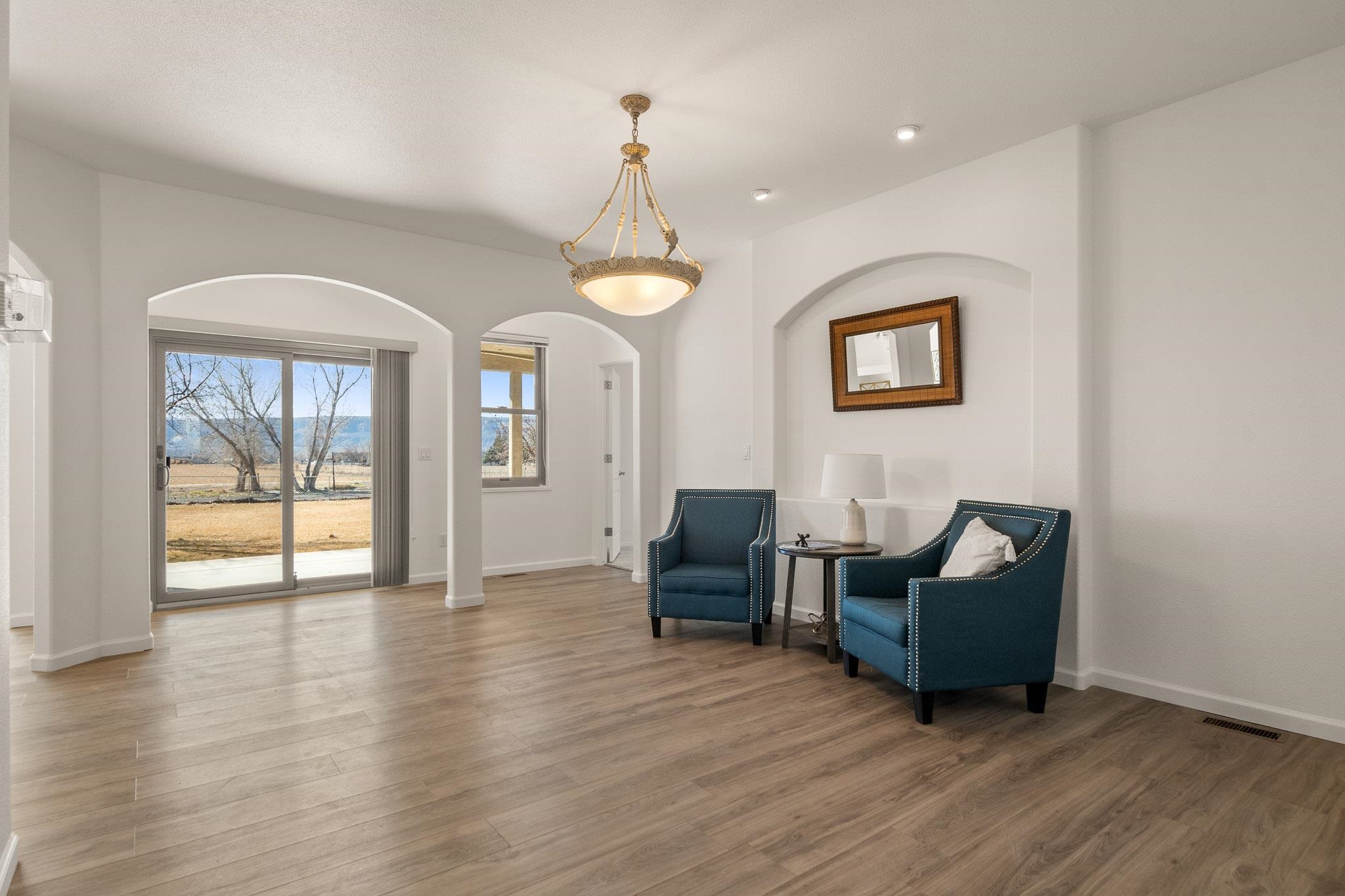 2107 I I- 1/2 Road Grand Junction, CO 81505 - Photo 15 of 42 a living room with furniture and wooden floor