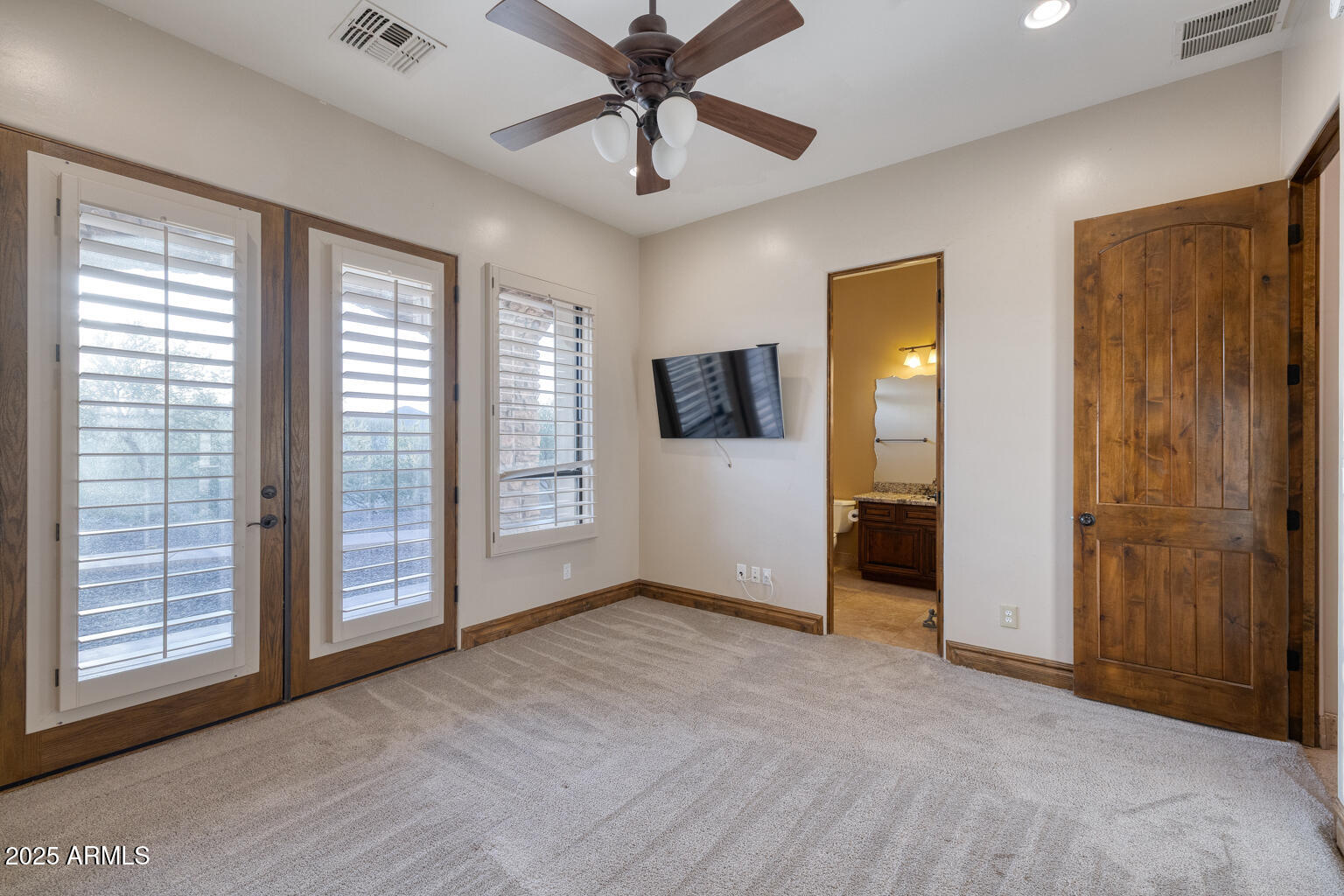 27115 North 137th Street Scottsdale, AZ 85262 - Photo 16 of 24 a view of an empty room with a window