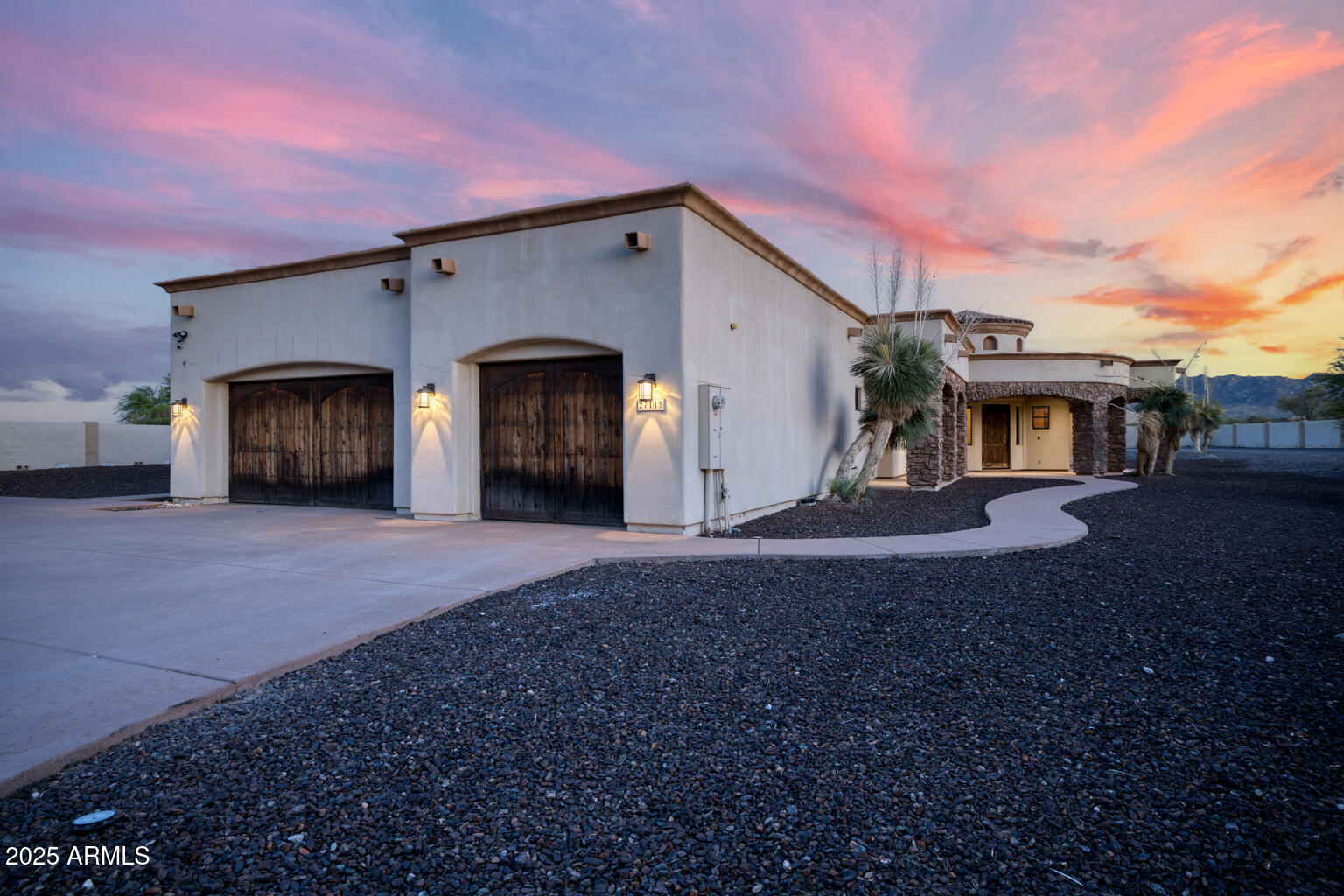 27115 North 137th Street Scottsdale, AZ 85262 - Photo 19 of 24 a front view of a house with a yard and garage