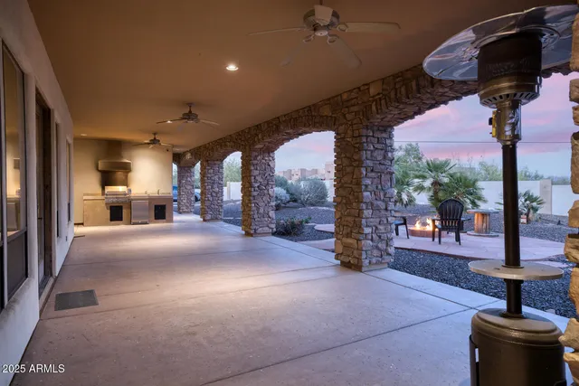 a lobby with furniture and a floor to ceiling window