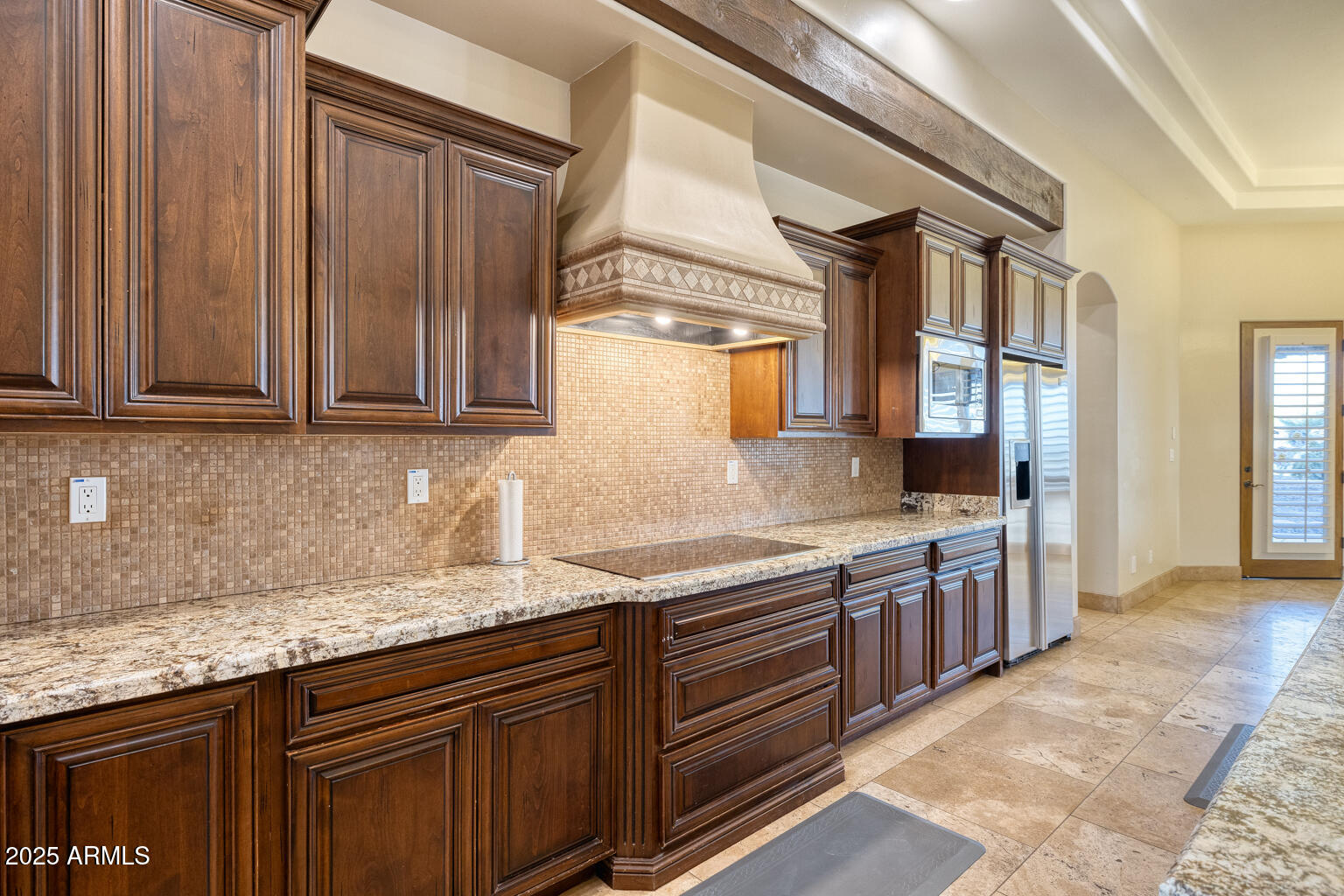 27115 North 137th Street Scottsdale, AZ 85262 - Photo 6 of 24 a kitchen with stainless steel appliances granite countertop a sink stove and cabinets