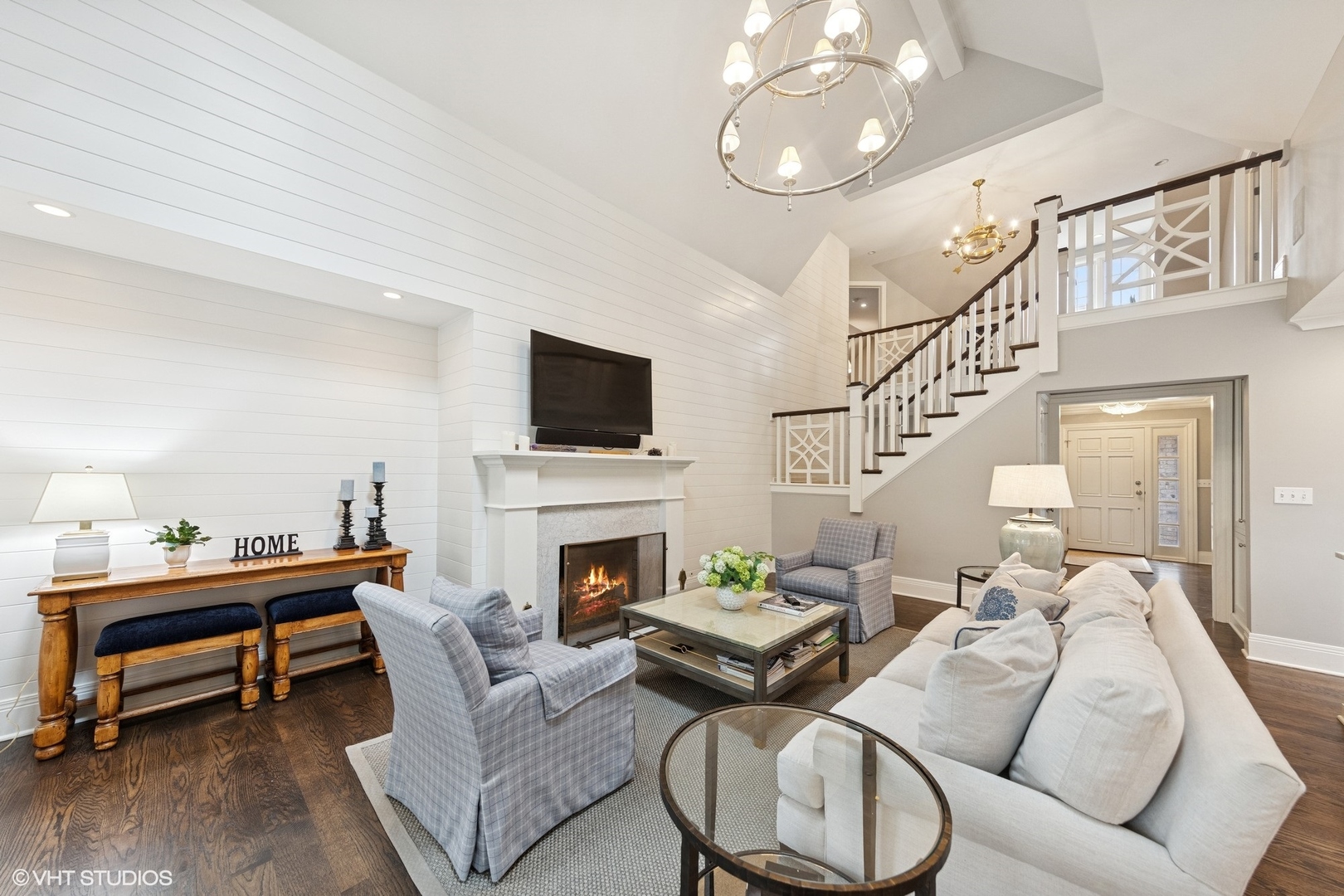 6 Tartan Ridge Road Burr Ridge, IL 60527 - Photo 11 of 41 a living room with furniture a fireplace and a flat screen tv