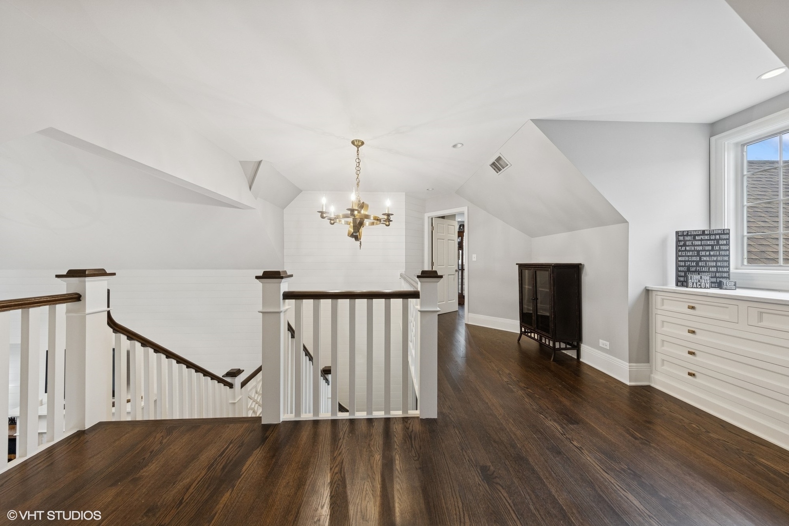 6 Tartan Ridge Road Burr Ridge, IL 60527 - Photo 21 of 41 a view of hallway with fireplace and wooden floor