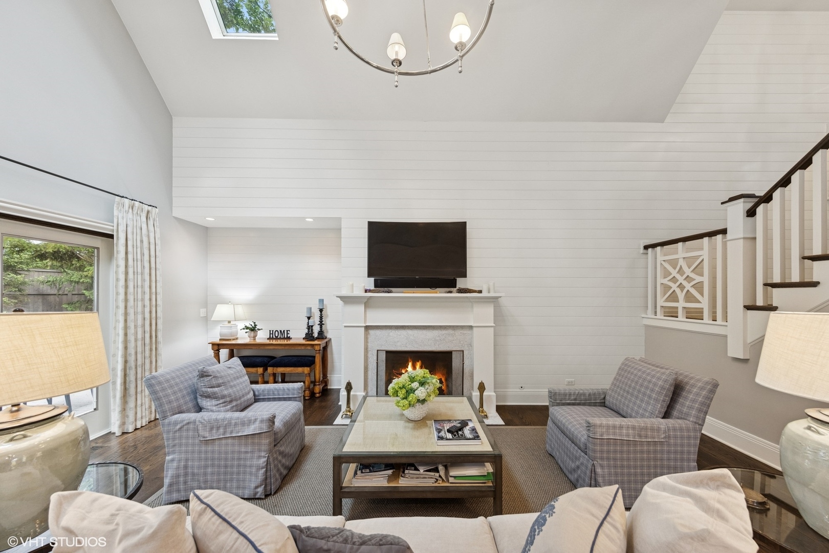 6 Tartan Ridge Road Burr Ridge, IL 60527 - Photo 10 of 41 a living room with furniture a flat screen tv and a fireplace
