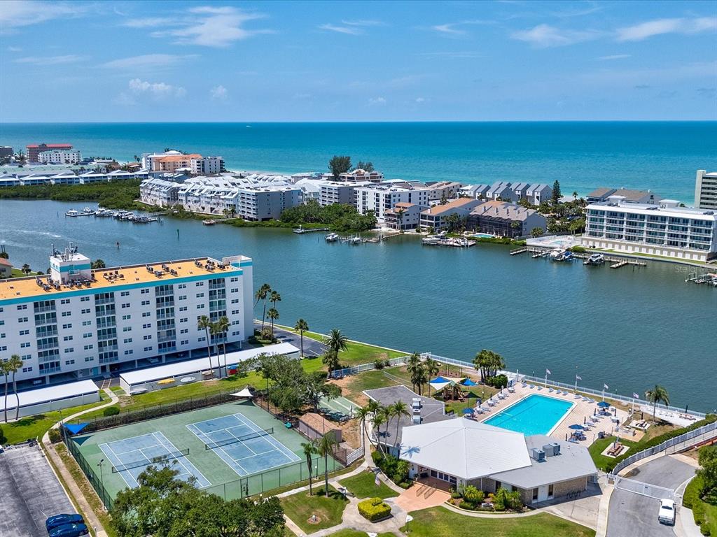 10216 Regal Drive, Unit 409 Largo, FL 33774 - Photo 28 of 42 swimming pool with outdoor seating and city view