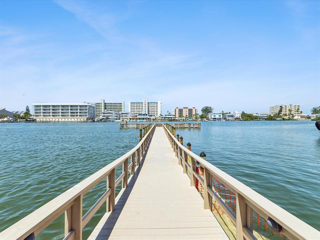 10216 Regal Drive, Unit 409 Largo, FL 33774 - Photo 31 of 42 a view of lake and city