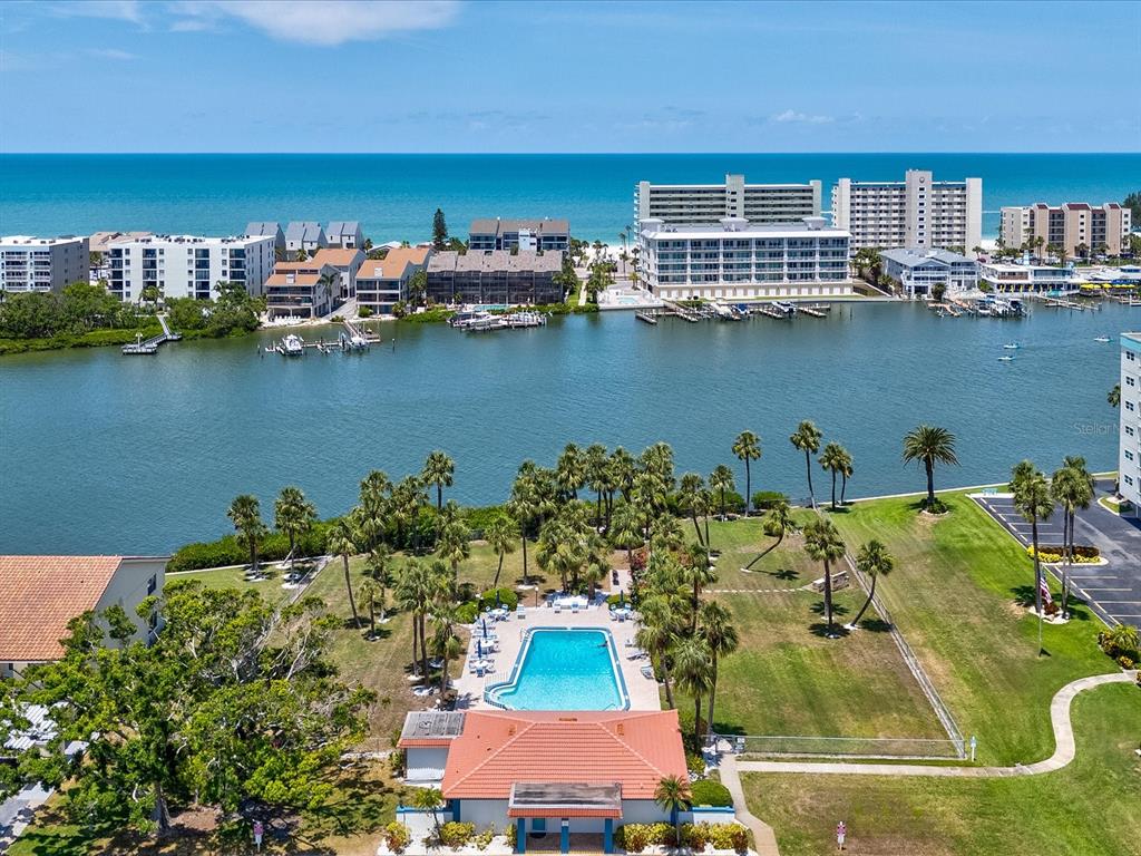 10216 Regal Drive, Unit 409 Largo, FL 33774 - Photo 40 of 42 an aerial view of a house with a lake view