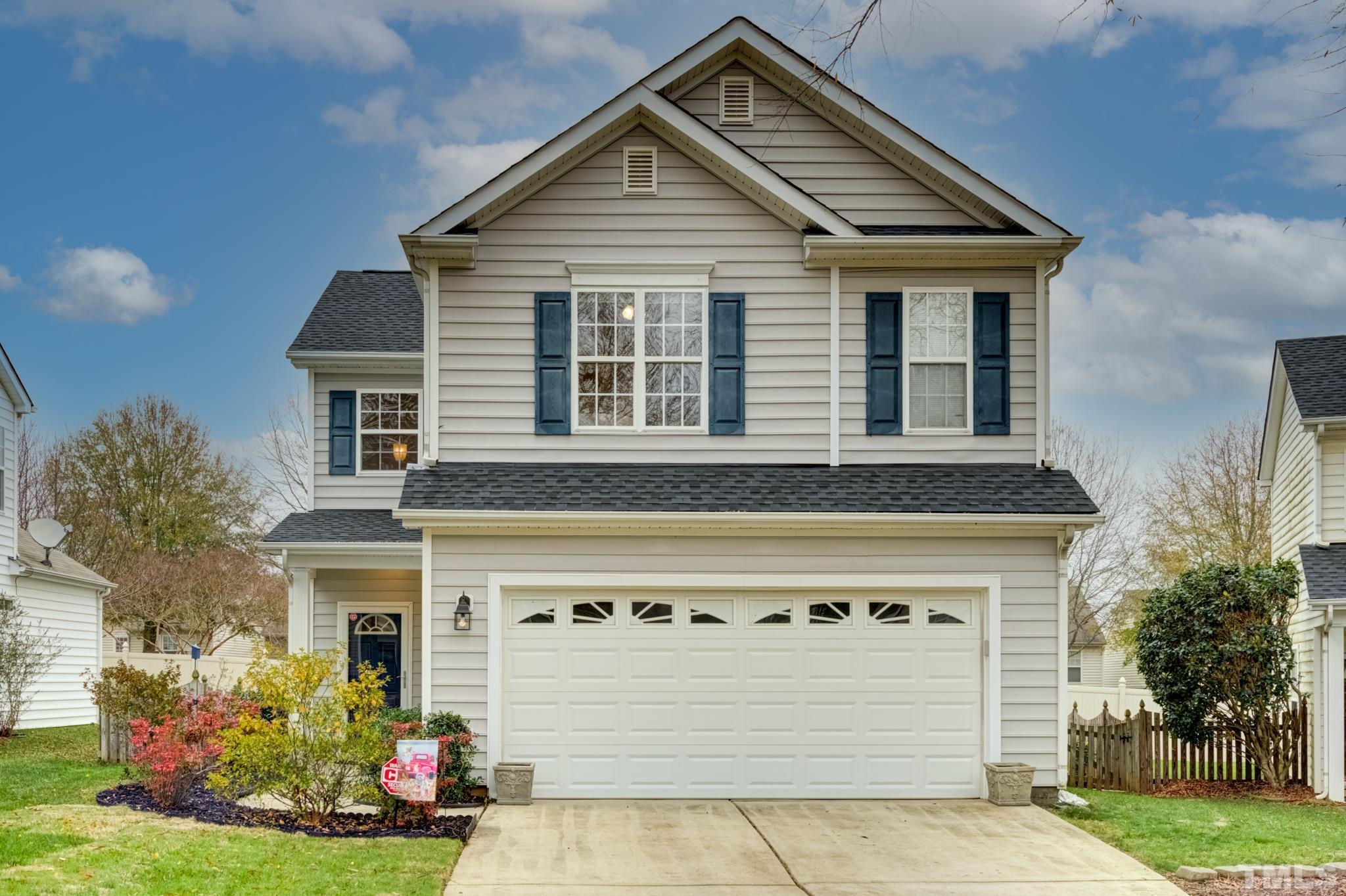 8206 Shadow Stone Court Raleigh, NC 27613 - Photo 1 of 52 a front view of a house with a yard