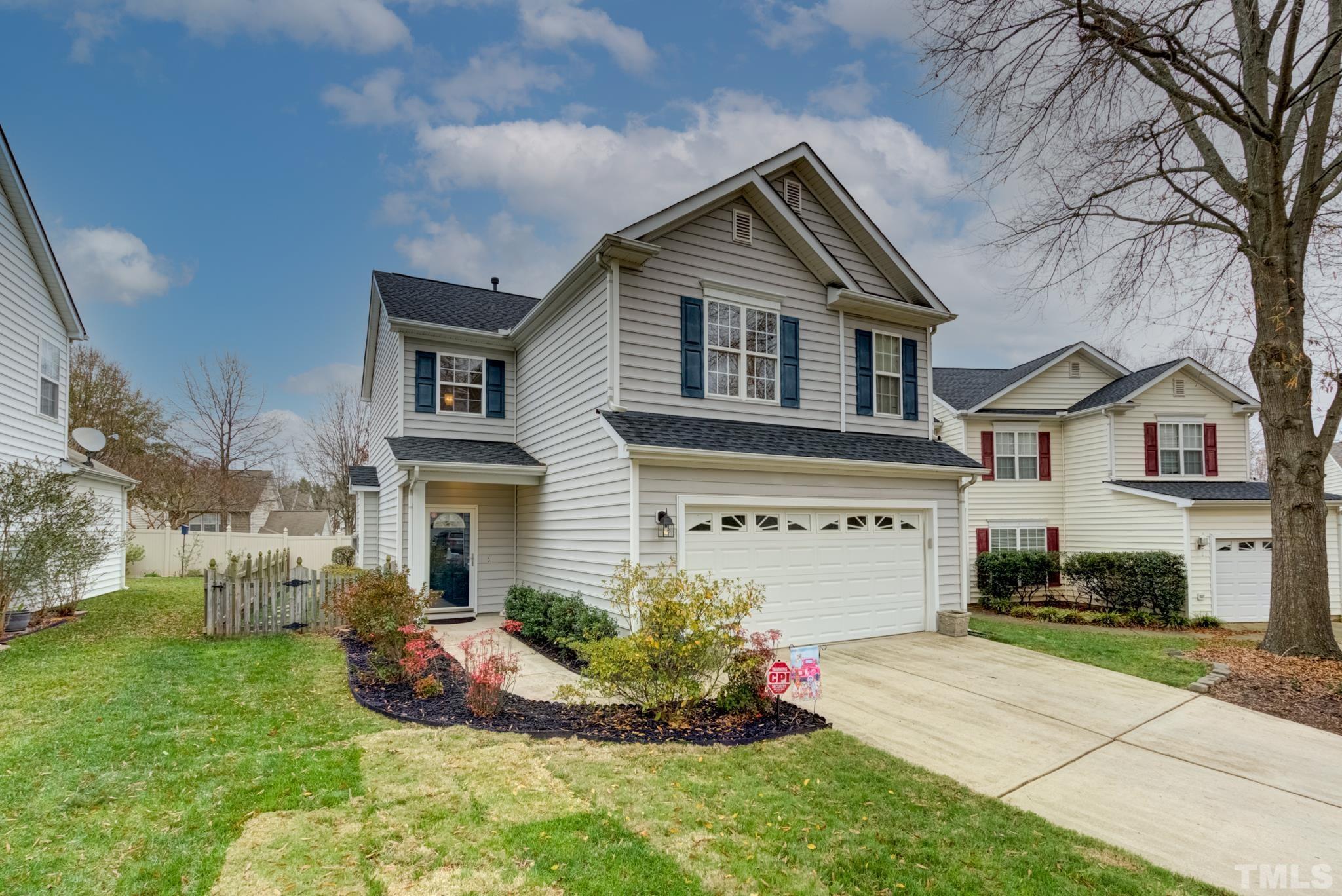 8206 Shadow Stone Court Raleigh, NC 27613 - Photo 3 of 52 a front view of a house with a yard