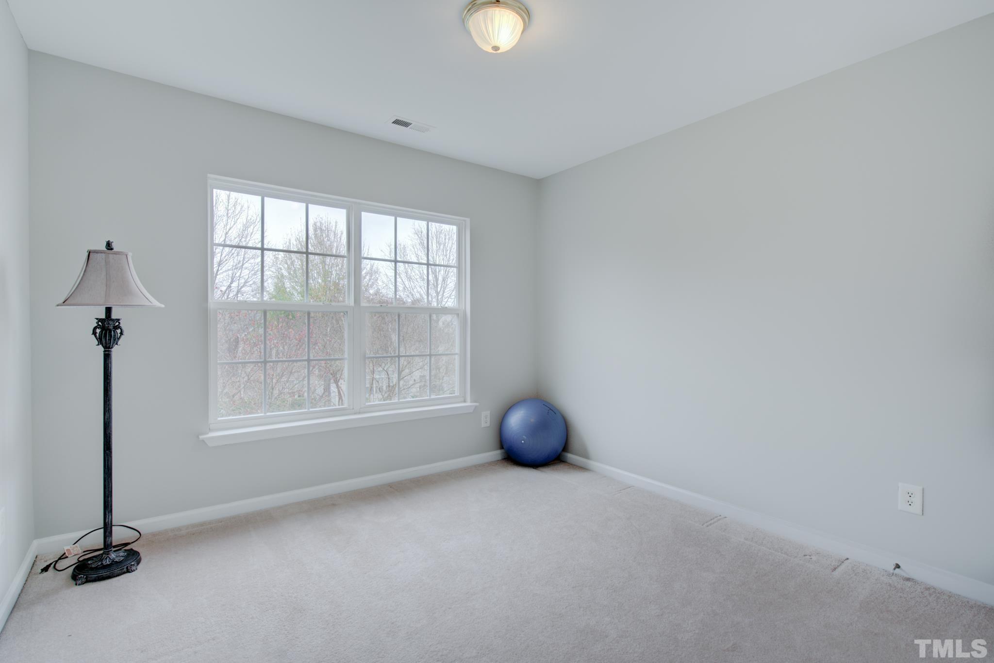 8206 Shadow Stone Court Raleigh, NC 27613 - Photo 34 of 52 a view of an empty room with a window