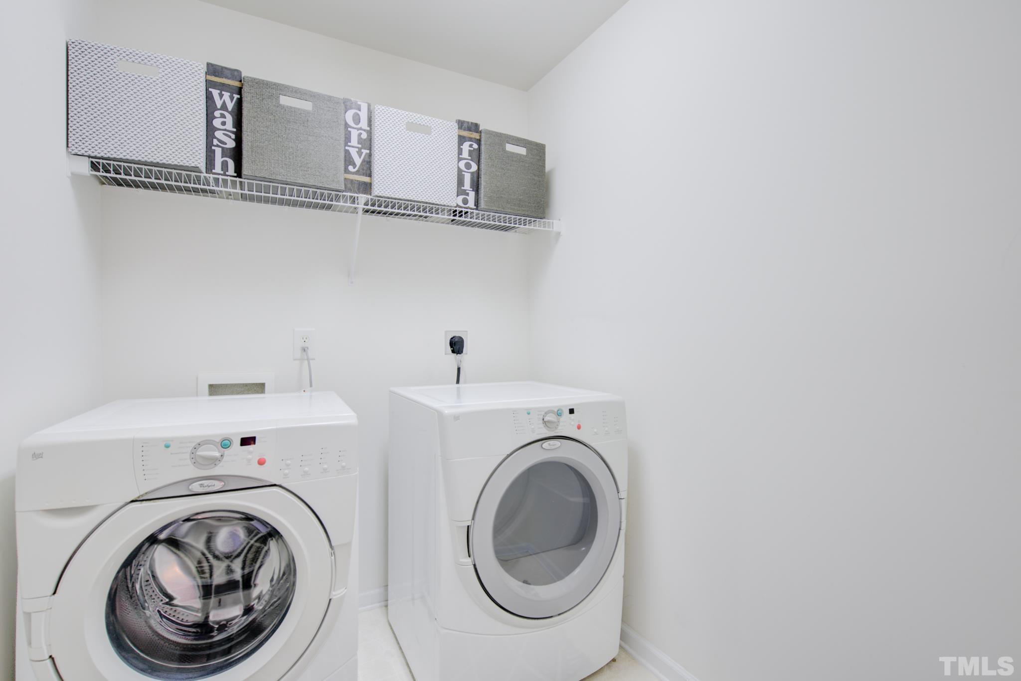 8206 Shadow Stone Court Raleigh, NC 27613 - Photo 40 of 52 a utility room with dryer and washer