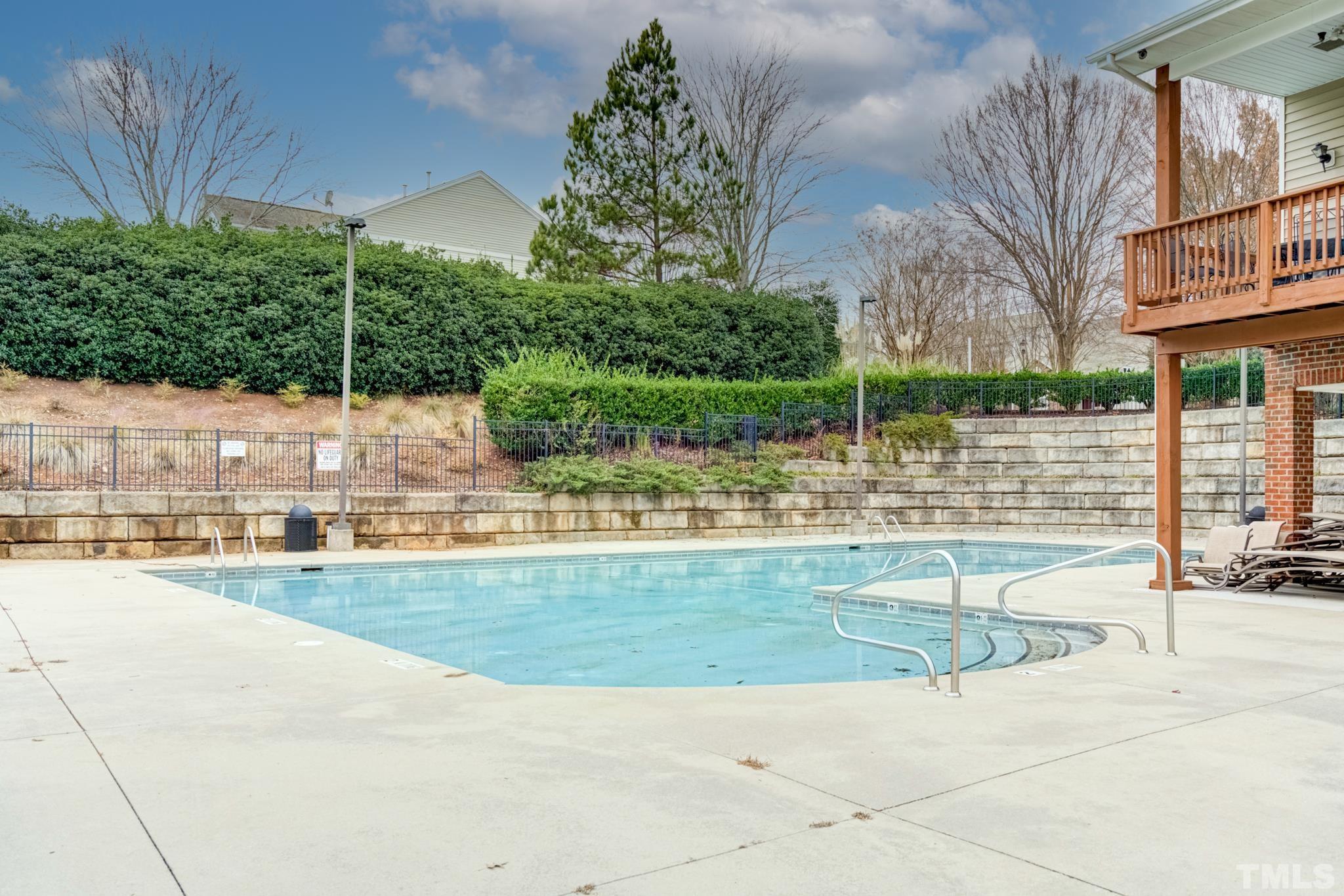 8206 Shadow Stone Court Raleigh, NC 27613 - Photo 47 of 52 a view of a swimming pool with a patio