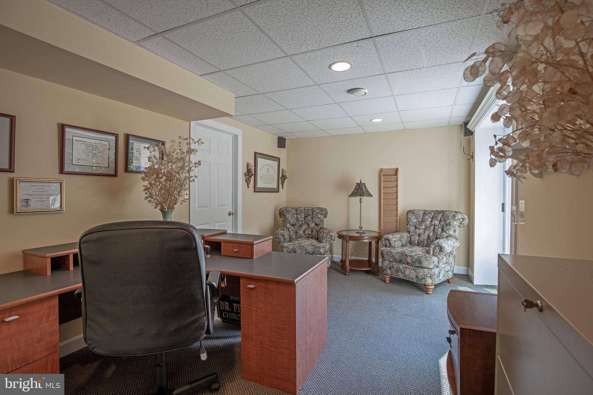 2228 Turk Road Doylestown, PA 18901 - Photo 38 of 53 a livingroom with workspace and a couch