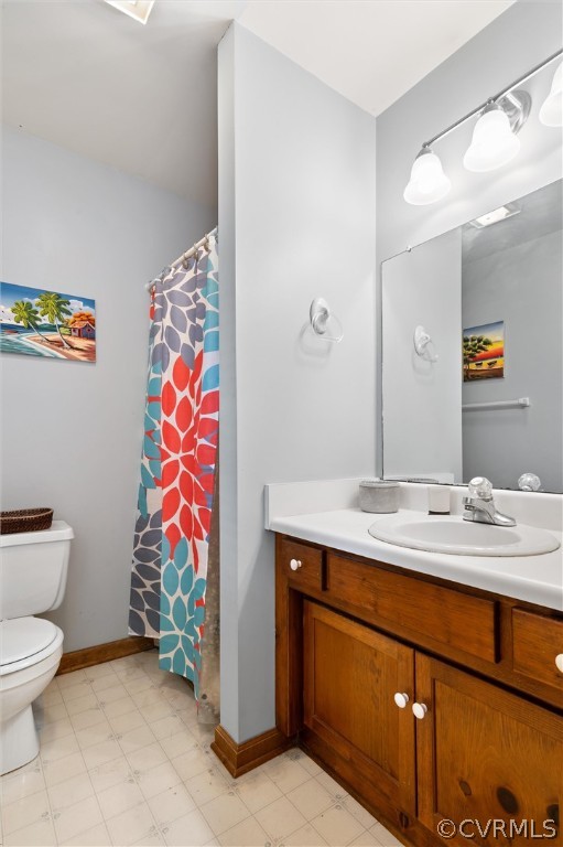 2631 Colgrave Road Midlothian, VA 23112 - Photo 17 of 23 a bathroom with a sink vanity and toilet