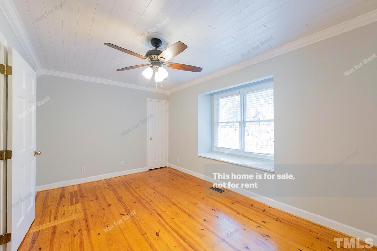 12008 Shooting Club Road Raleigh, NC 27613 - Photo 15 of 23 a view of empty room with window