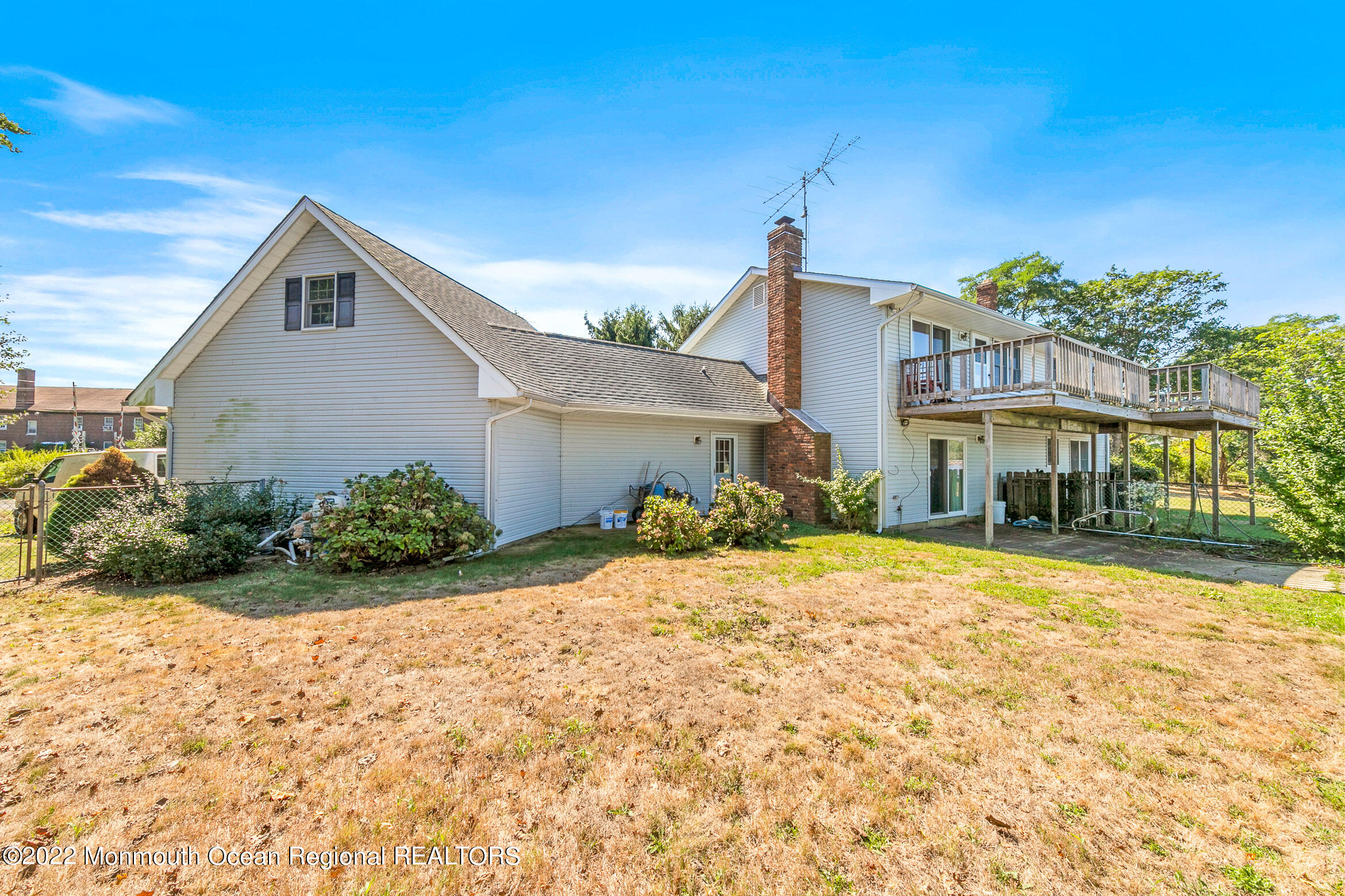 69 Horseneck Point Road Oceanport, NJ 07757 - Photo 18 of 22 a front view of a house with a yard