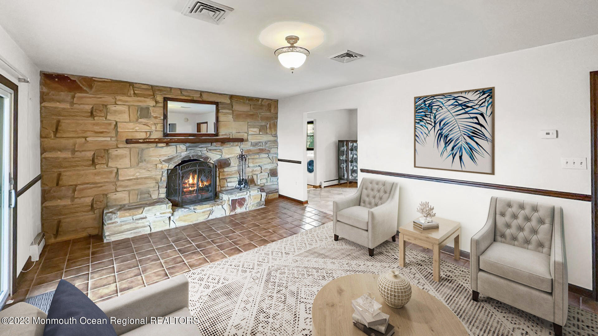 69 Horseneck Point Road Oceanport, NJ 07757 - Photo 4 of 22 a living room with furniture a fireplace and a flat screen tv