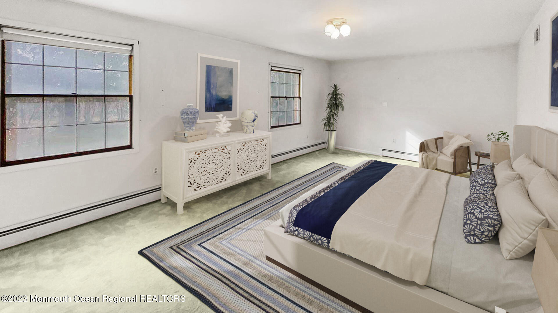 69 Horseneck Point Road Oceanport, NJ 07757 - Photo 8 of 22 a bedroom with a bed and a window