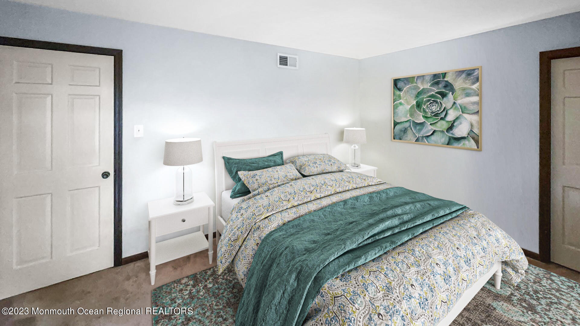 69 Horseneck Point Road Oceanport, NJ 07757 - Photo 10 of 22 a bedroom with a bed and a painting on the wall