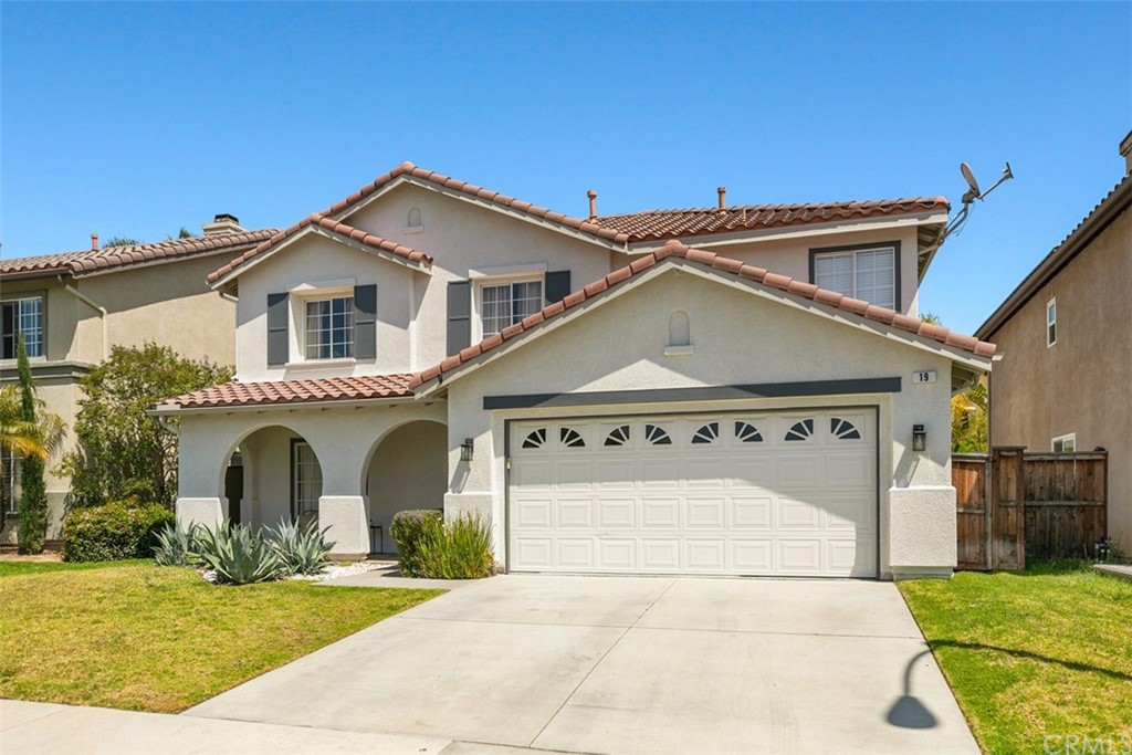 19 Valeroso Rancho Santa Margarita, CA 92688 - Photo 1 of 1 a front view of a house with a yard
