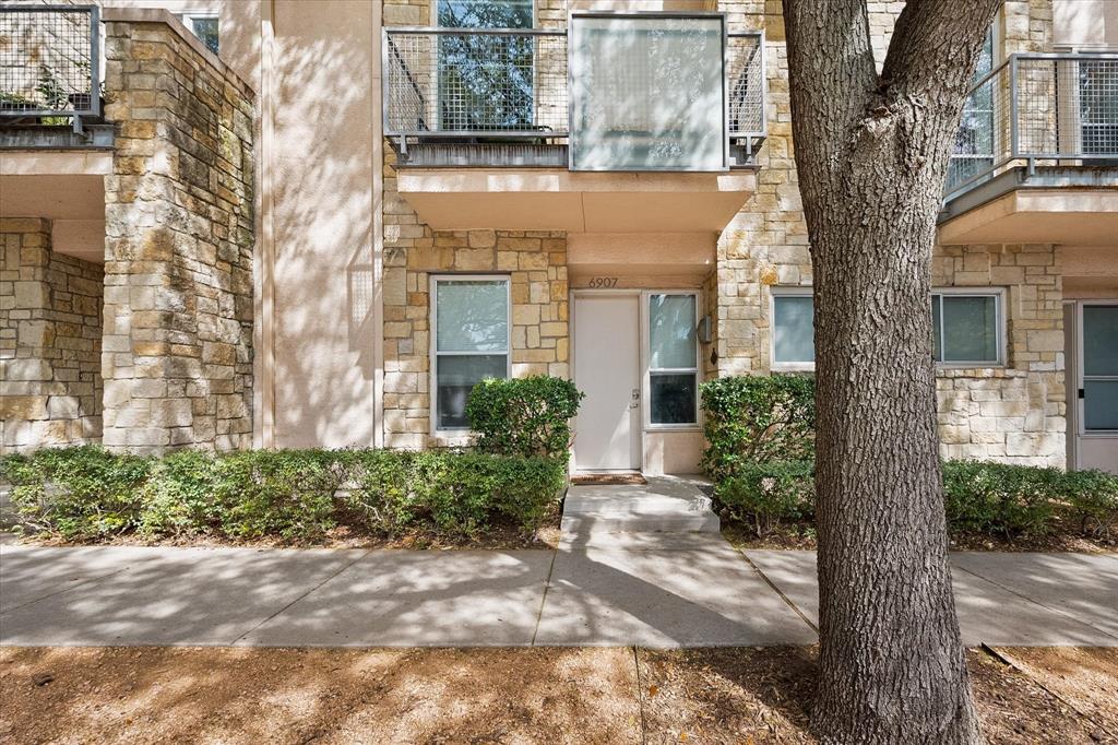 6907 Sumner Street The Colony, TX 75056 - Photo 11 of 33 A 3-story modern lofted townhome in The Colony.