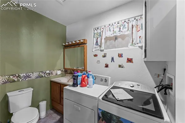 a bathroom with a sink toilet and a bathtub