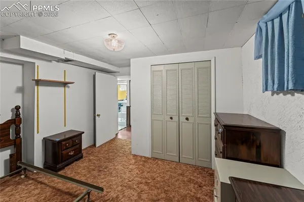 a view of a livingroom with furniture