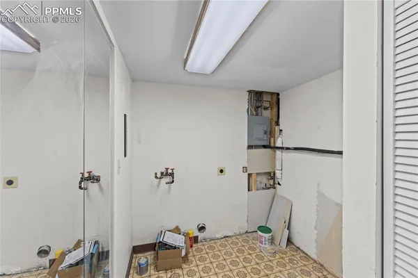 a front view of a house with a yard swimming pool and outdoor seating