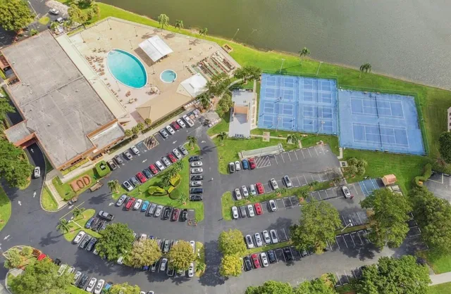 a sign that is sitting in front of a house