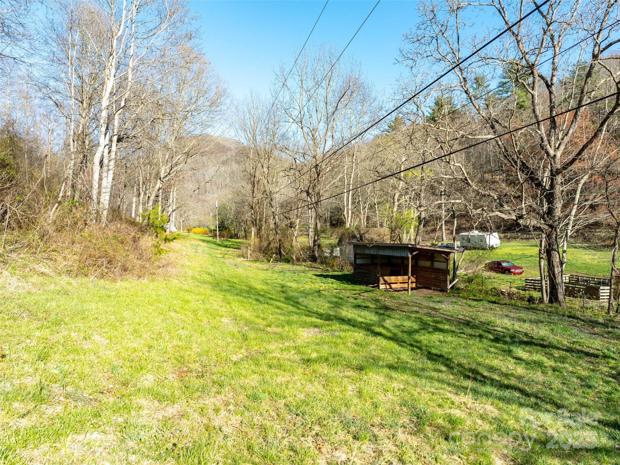 37 Wild Rock Court Clyde, NC 28721 - Photo 8 of 15 a view of a house with a yard
