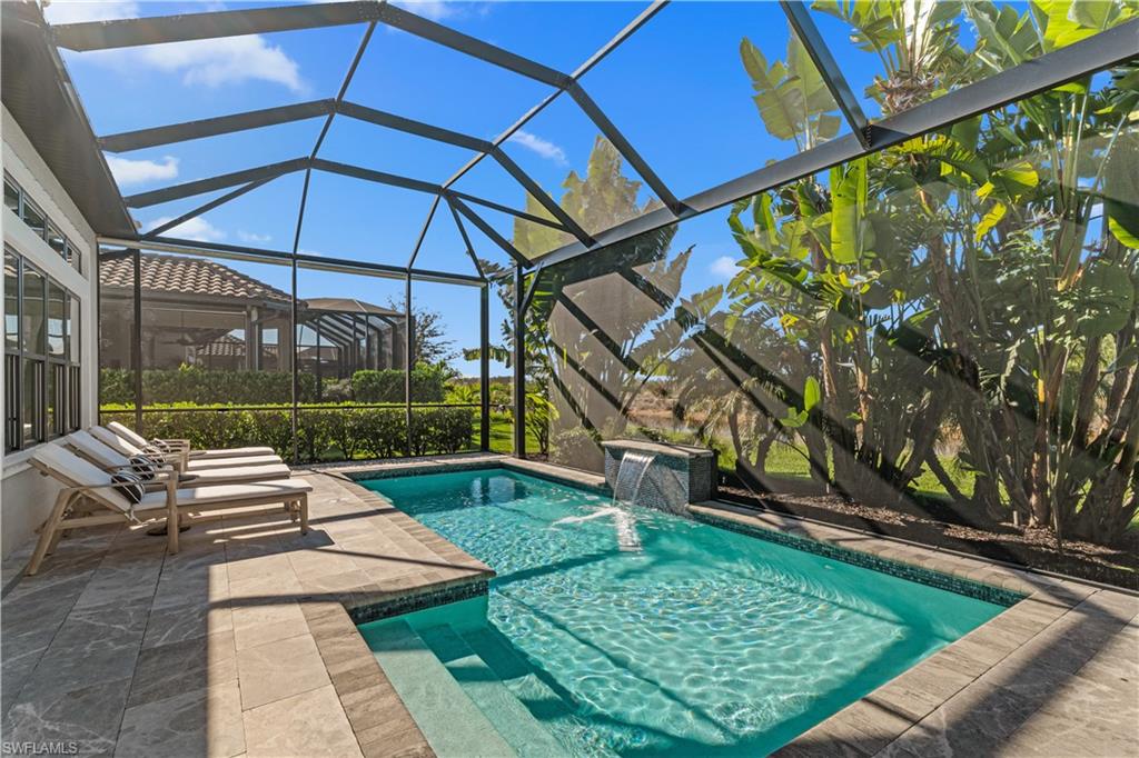 9517 Montelanico Loop Naples, FL 34119 - Photo 31 of 50 a view of yard with patio