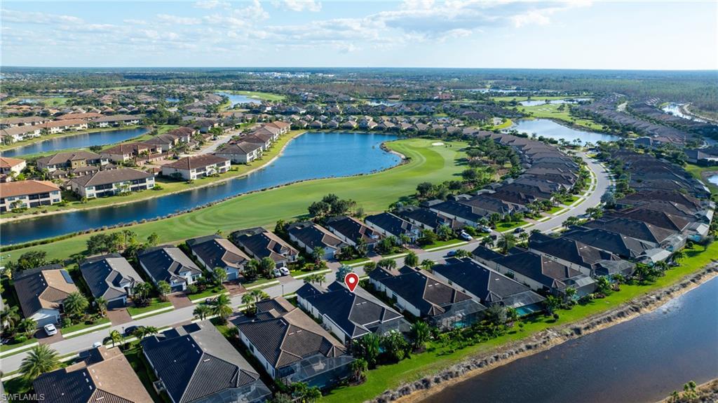 9517 Montelanico Loop Naples, FL 34119 - Photo 35 of 50 an aerial view of a city