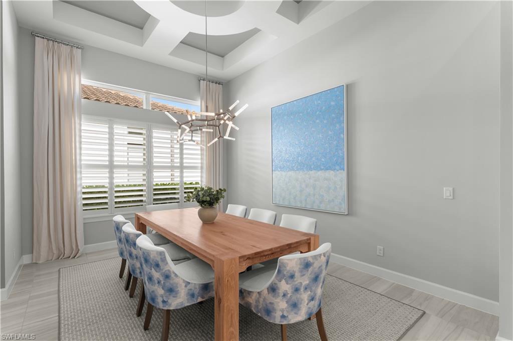 9517 Montelanico Loop Naples, FL 34119 - Photo 6 of 50 a view of a dining room with furniture and window