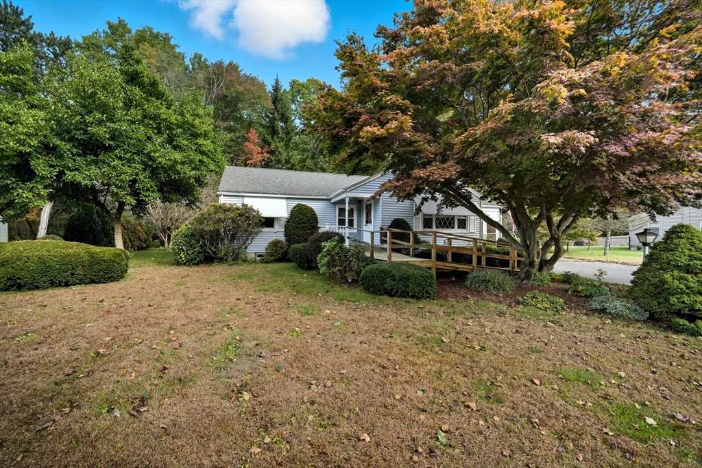 95 Meadowbrook Road Agawam, MA 01001 - Photo 2 of 39 a house with trees in the background