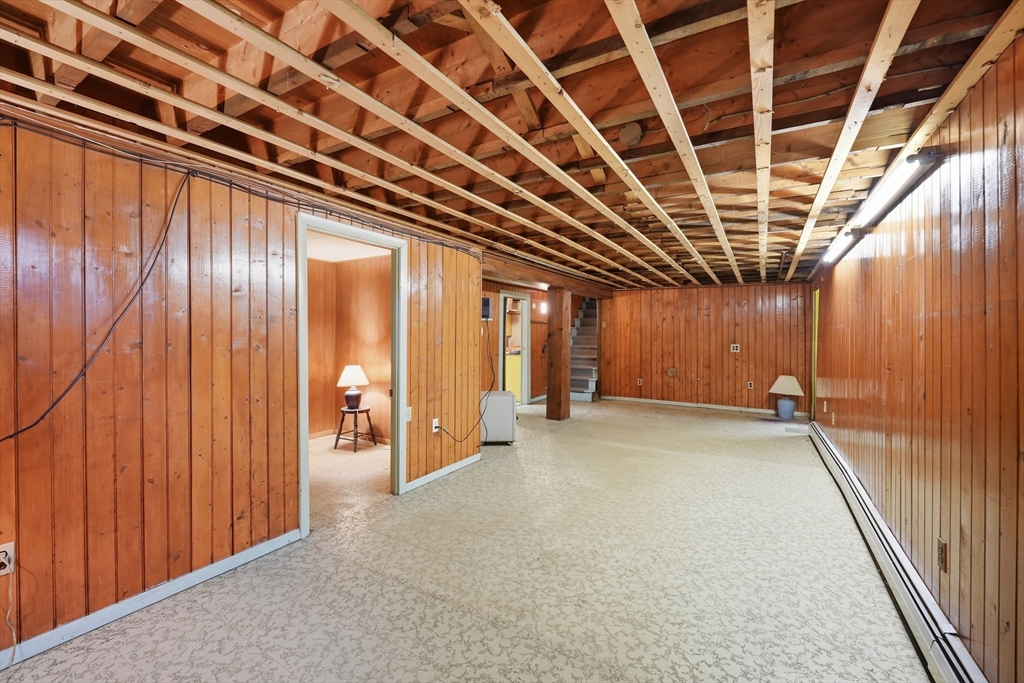 95 Meadowbrook Road Agawam, MA 01001 - Photo 29 of 39 a view of an empty room with wooden walls