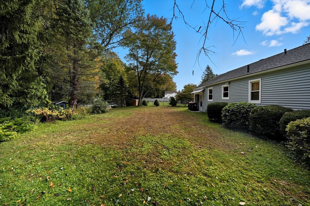 95 Meadowbrook Road Agawam, MA 01001 - Photo 35 of 39 a backyard of a house with lots of green space