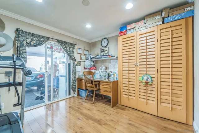 a workspace with furniture and wooden floor