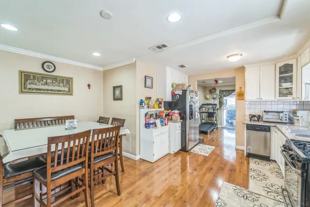 a view of a dining room with furniture