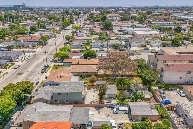 an aerial view of a city with lots of residential buildings