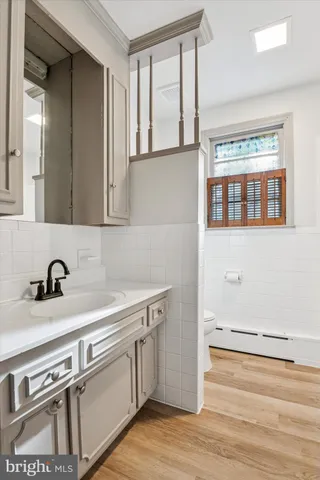 a view of a kitchen with a sink and dishwasher